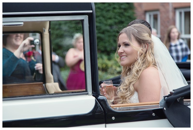 Bride and Groom in wedding car