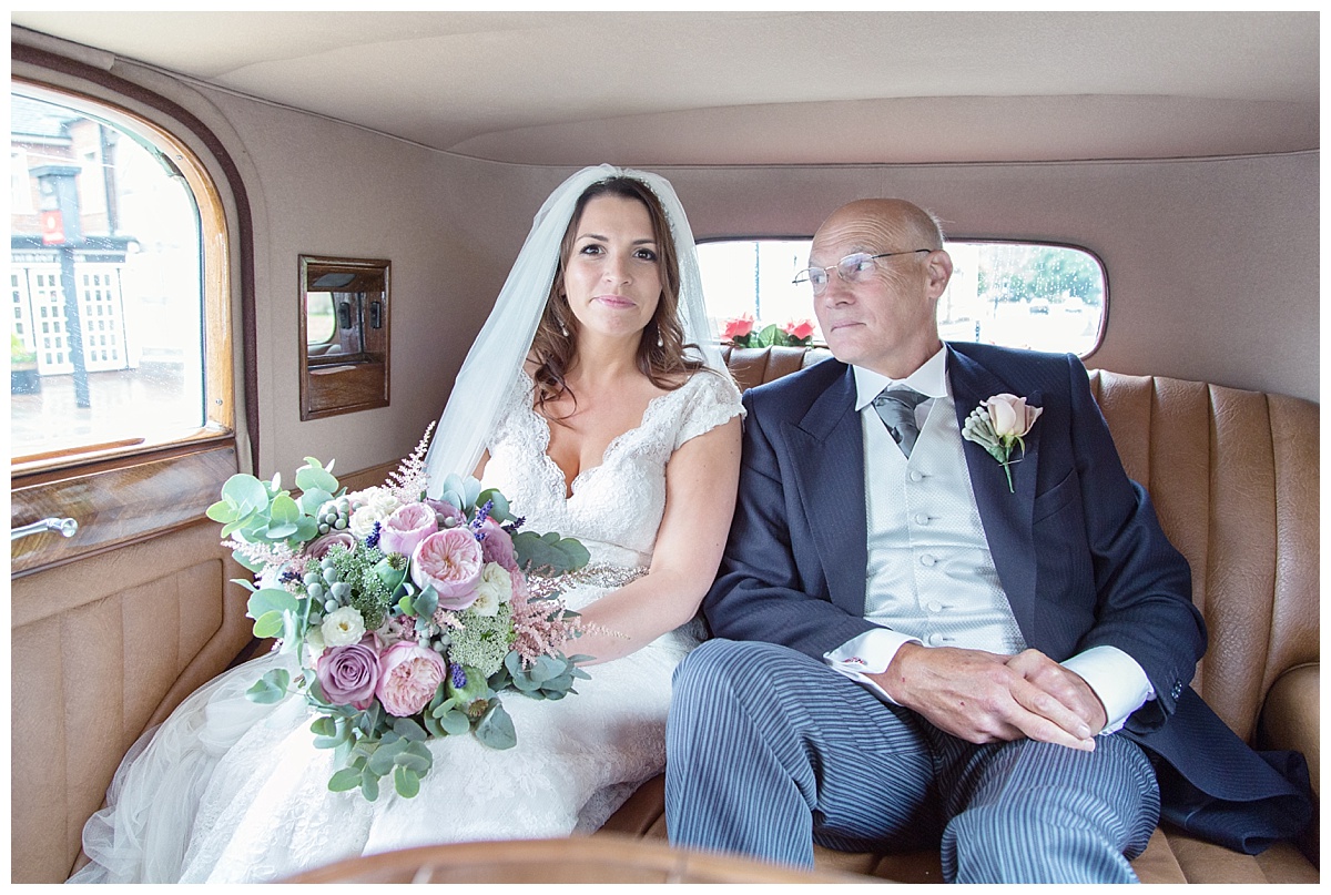 bride and her dad in the car
