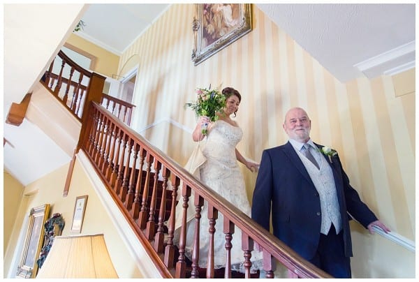coming down the stairs with Dad