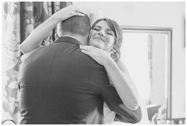 dad and daughter hugs