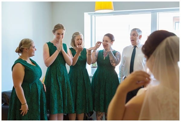 Dad and bridesmaid reaction